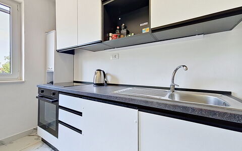 Aurora: Küche, Countertop, Cabinetry, Küchengerät, Major Appliance, Flooring, Interior Design, Holz, Spüle, Zuhause
