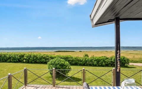 Gustav - 50M from the Sea: Himmel, Möbel, Schatten, Veranda, Deck, Gartenmöbel, Tisch Im Freien, Küste, Ozean, Stuhl