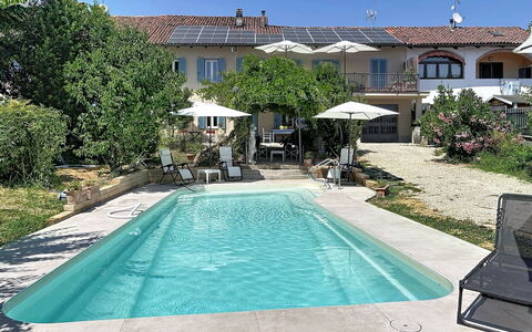 La Casetta di Palmira: Schwimmbad, Gartenmöbel, Resort, Freizeit, Regenschirm, Möbel, Verbundwerkstoff, Sonnenliege, Erholung, Eco Hotel