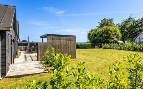 Andriette - 50M from the Sea: Ground, Hütte, Garten, Planke, Landscaping, Walkway, Garten, Zaun, Promenade, Abstellgleis
