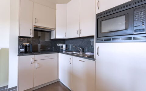 Residentie Casa Nova: Countertop, Interior Design, Küche, Flooring, Cabinetry, Major Appliance, Fussboden, Küchengerät, Zimmer, Sinken
