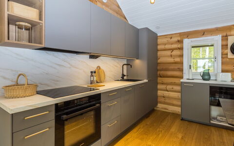Villa Praava B: Flooring, Holz, Countertop, Interior Design, Küche, Cabinetry, Möbel, Küchengerät, Fussboden, Holzboden