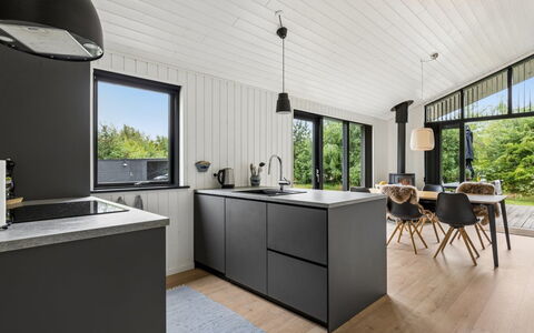 Pertti - 750M from the Sea: Küche, Countertop, Holz, Interior Design, Möbel, Küchengerät, Decke, Cabinetry, Flooring, Zapfhahn