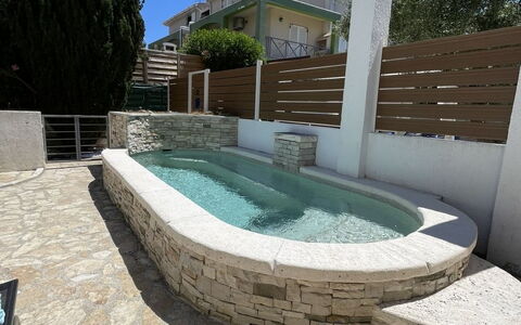 Volme: Verbundwerkstoff, Schwimmbad, Flagstone, Water Feature, Gartenmöbel, Beton, Steinwand, Fliese, Schatten, Cobblestone