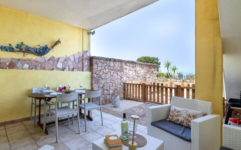 Sunset House Isola Rossa: Blau, Balkon, Geländer, Wohnung, Zaun, Meer, Resort, Eigentumswohnung, Schwimmbad, Hotel
