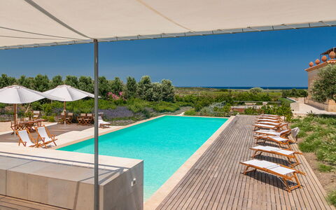 Villa Passo degli Aironi 12: Schwimmbad, Resort, Verbundwerkstoff, Gartenmöbel, Estate, Eco Hotel, Hazienda, Landscaping, Villa, Schatten