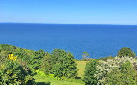 Cliff Lodge: Blau, Himmel, Grün, Horizont, Vegetation, Natürliche Landschaft, Wiese, Strauch, Meer, Wolke