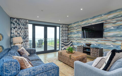 Goferydd: Möbel, Wohnung, Küste, Resort, Wohnzimmer, Couch, Hotel