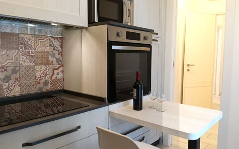 Oasi Blocco a: Flooring, Interior Design, Küche, Countertop, Fussboden, Küchengerät, Möbel, Major Appliance, Cabinetry, Zimmer
