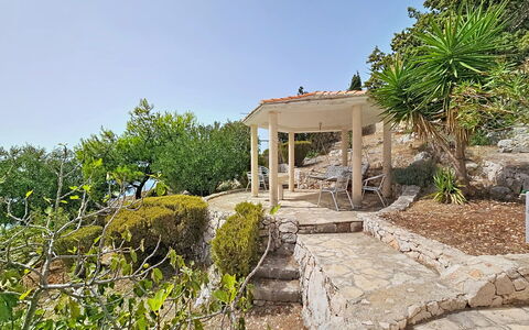 Marina Sevid 106: Strauch, Garten, Landscaping, Schatten, Outdoor Struktur, Treppe, Flagstone, Walkway, Botanischer Garten, Hinterhof