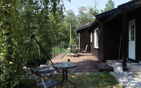 Porsmyr: Holz, Hütte, Zuhause, Hinterhof, Schatten, Garten, Garten, Stuhl, Veranda, Gartenbauten