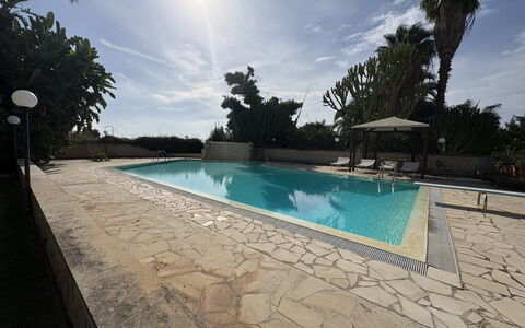 Villa le Palme, Marina di Ragusa: Schwimmbad, Resort, Schatten, Water Feature, Flagstone, Hazienda, Eco Hotel, Landscaping, Hotel