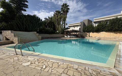 Villa le Palme, Marina di Ragusa: Schwimmbad, Resort, Wohngebiet, Verbundwerkstoff, Water Feature, Schatten, Estate, Eco Hotel, Hotel