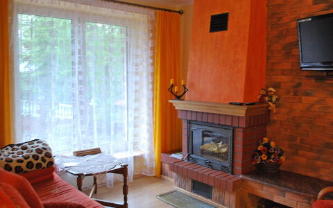 Mielno 2: Zimmer, Eigentum, Möbel, Wohnzimmer, Orange, Interior Design, Feuerstelle, Haus, Kamin, Zuhause