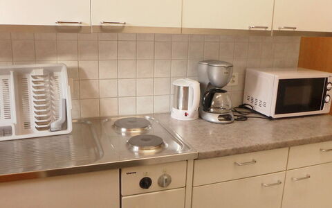 Grindelwald 255: Cabinetry, Eigentum, Möbel, Countertop, Küchengerät, Herd, Küche, Haushaltsgerät, Geschirr, Cooktop