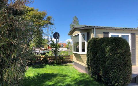 Wieringen 200: Pflanze, Möbel, Himmel, Eigentum, Tabelle, Gebäude, Wolke, Fenster, Stuhl, Gartenmöbel
