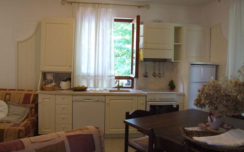 Villa La Quercia: Zimmer, Möbel, Eigentum, Interior Design, Gebäude, Fussboden, Haus, Tabelle, Küche, Wohnzimmer